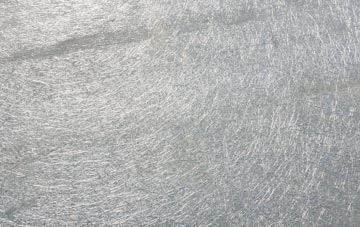 Cosmore laminate fibreglass or shingles?